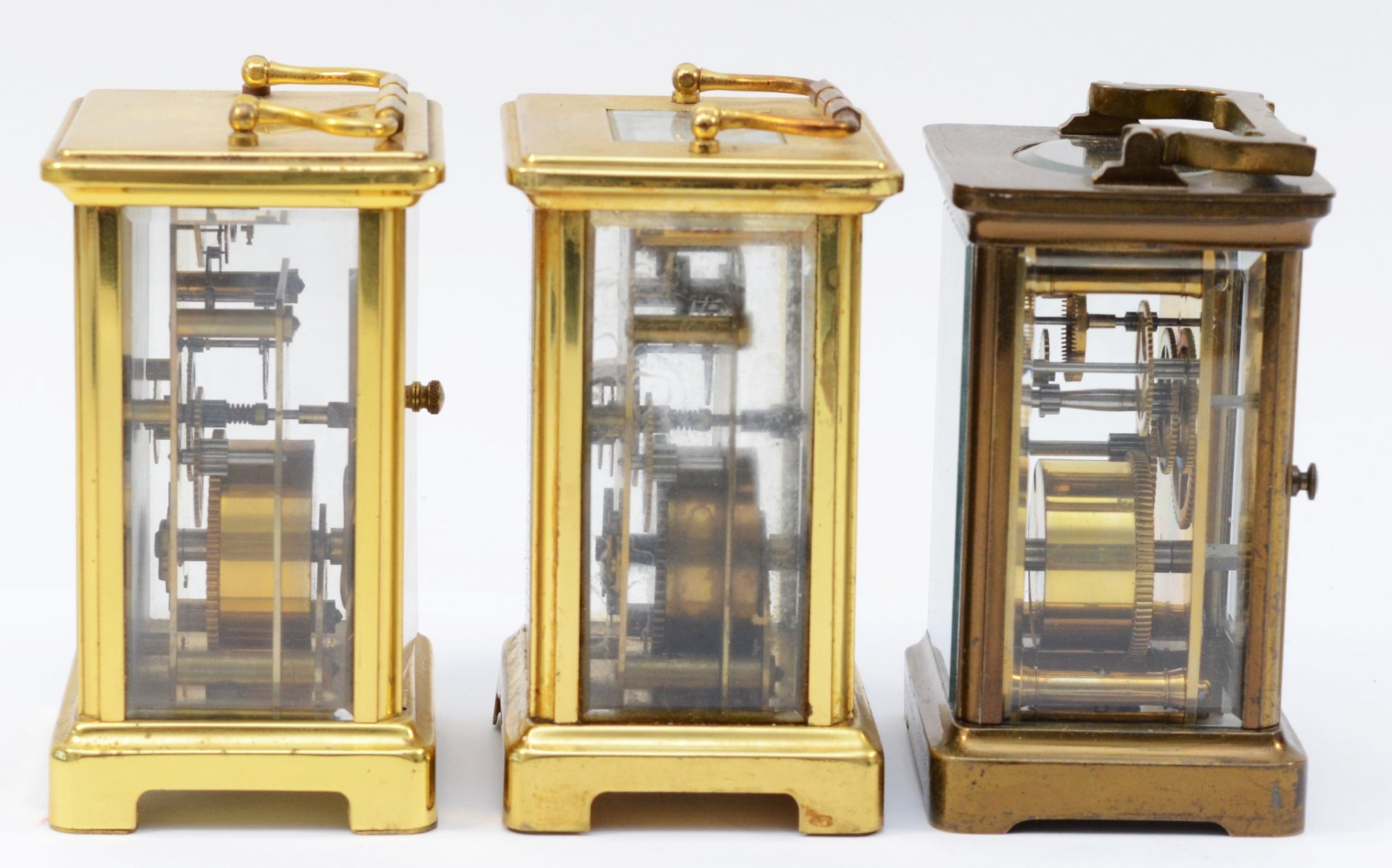 Three French 8 day carriage clocks, brass cased with enamelled dials and Roman numerals. (3) - Image 4 of 5