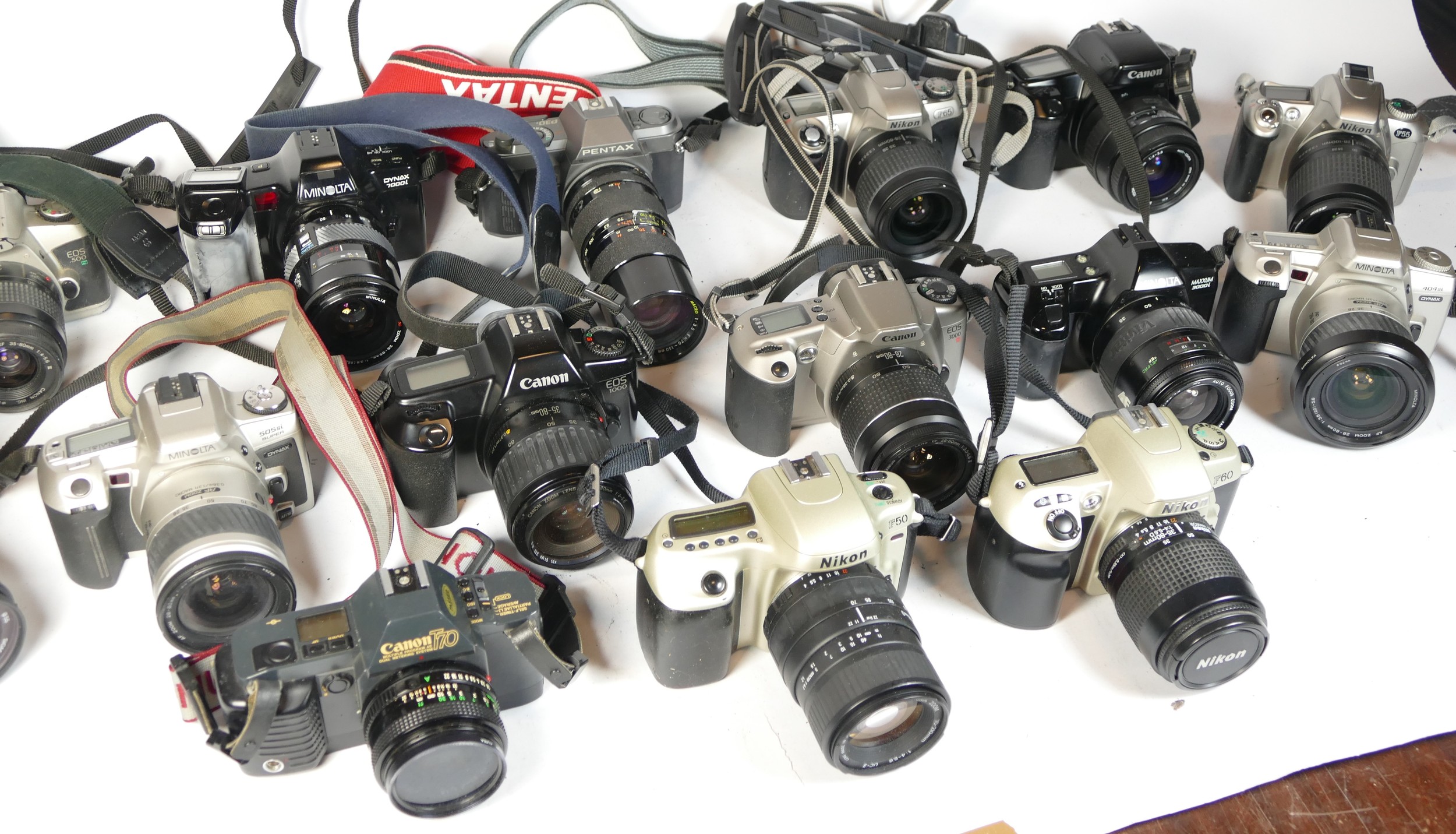 Twenty two SLR vintage film cameras to include a canon EOS 1000, a Canon EOS 500, a Nikon F50 and - Image 2 of 2