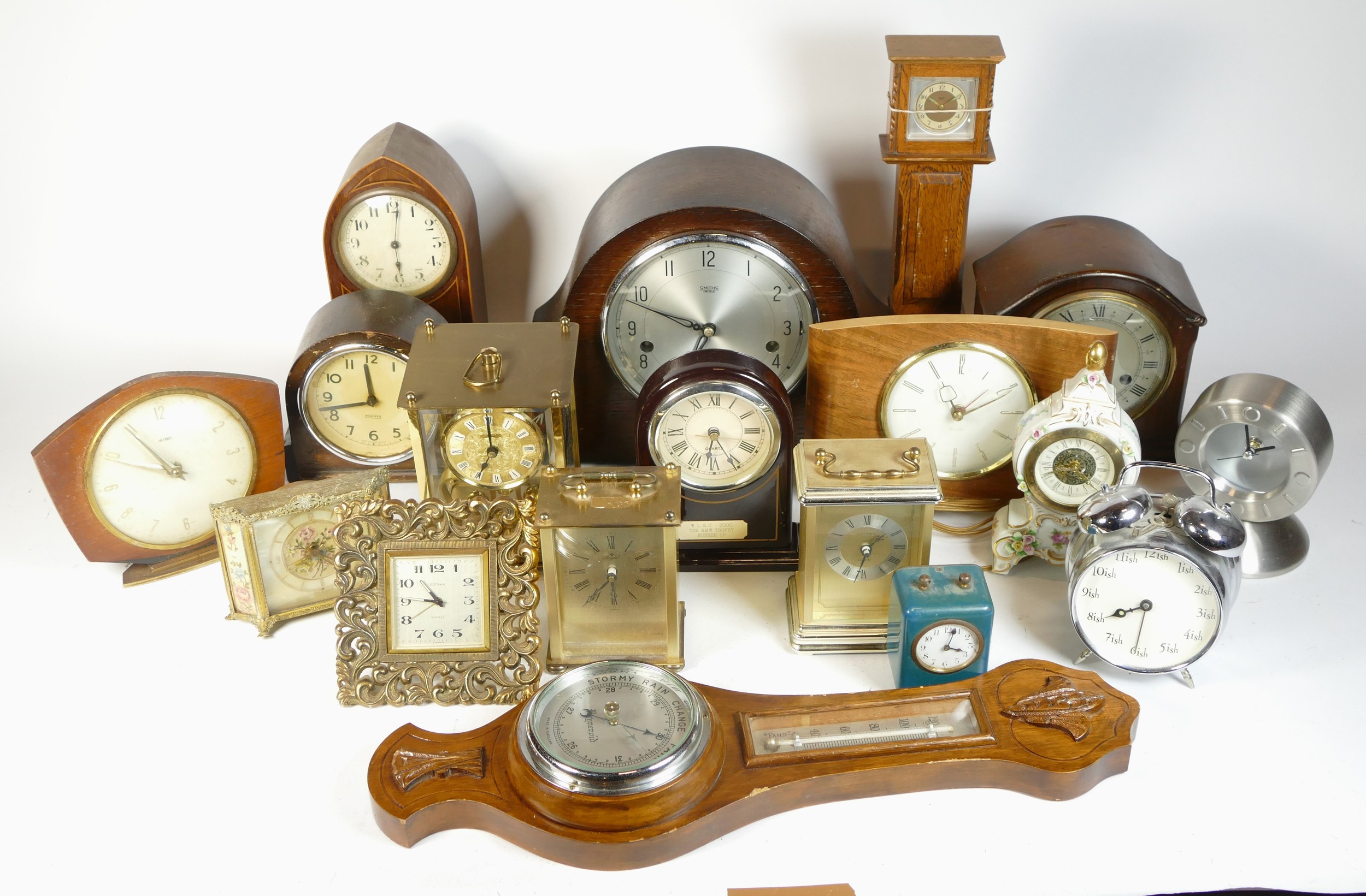 A collection of mid 20th century and later mantel clocks, alarm clocks and barometers in three - Image 2 of 3