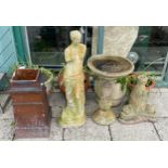 A collection of garden ornaments, to include a stoneware bird bath, a statue, a chimney pot and