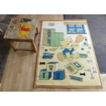 A light oak child's play table, having carved and painted top of Winnie The Pooh, 51x51cm,