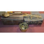 A set of three early 20th century graduated brass jam pans, together with brass fire irons, a