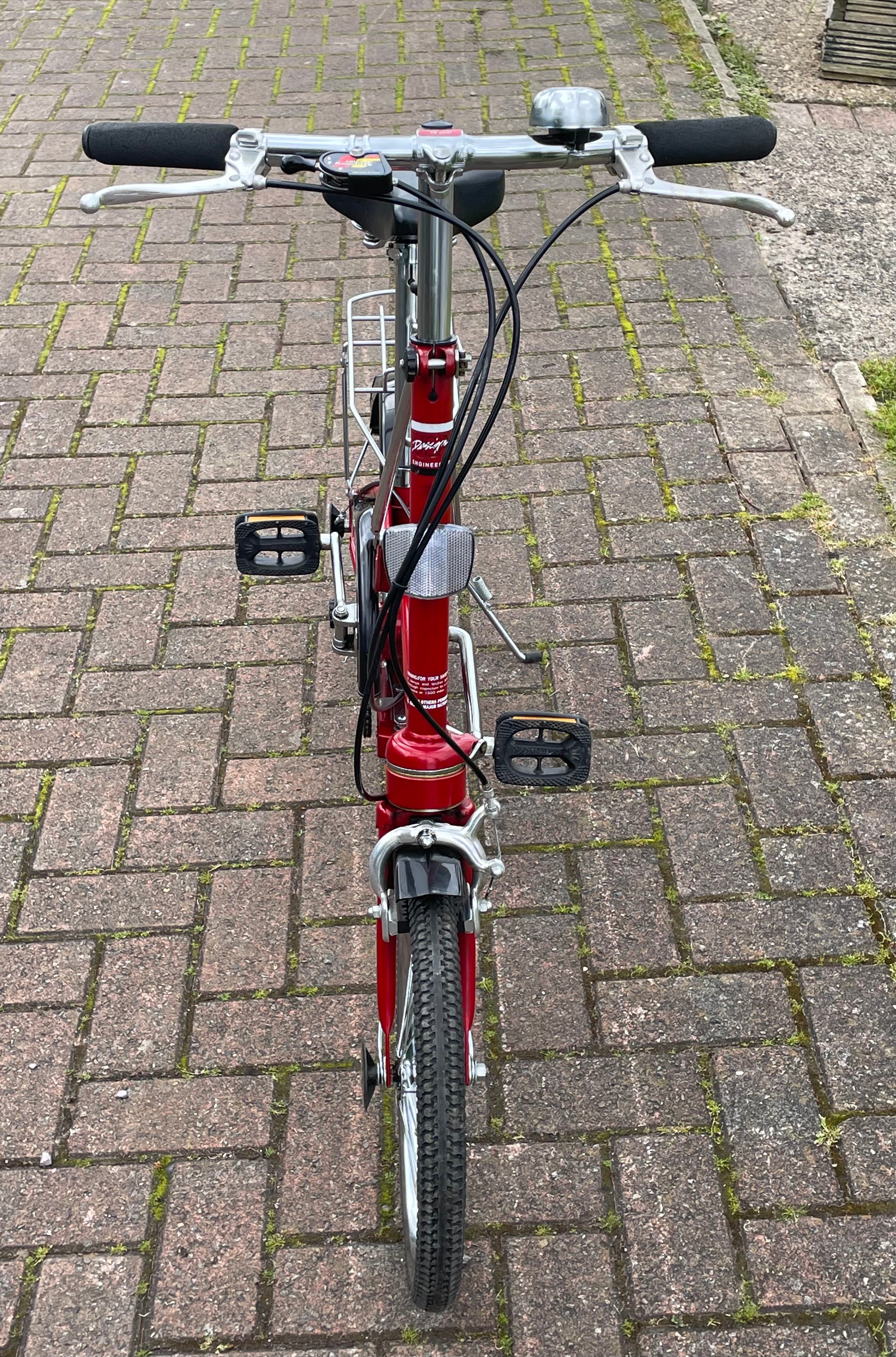 A Dahon folding bicycle, metallic red with carry case. - Image 5 of 7