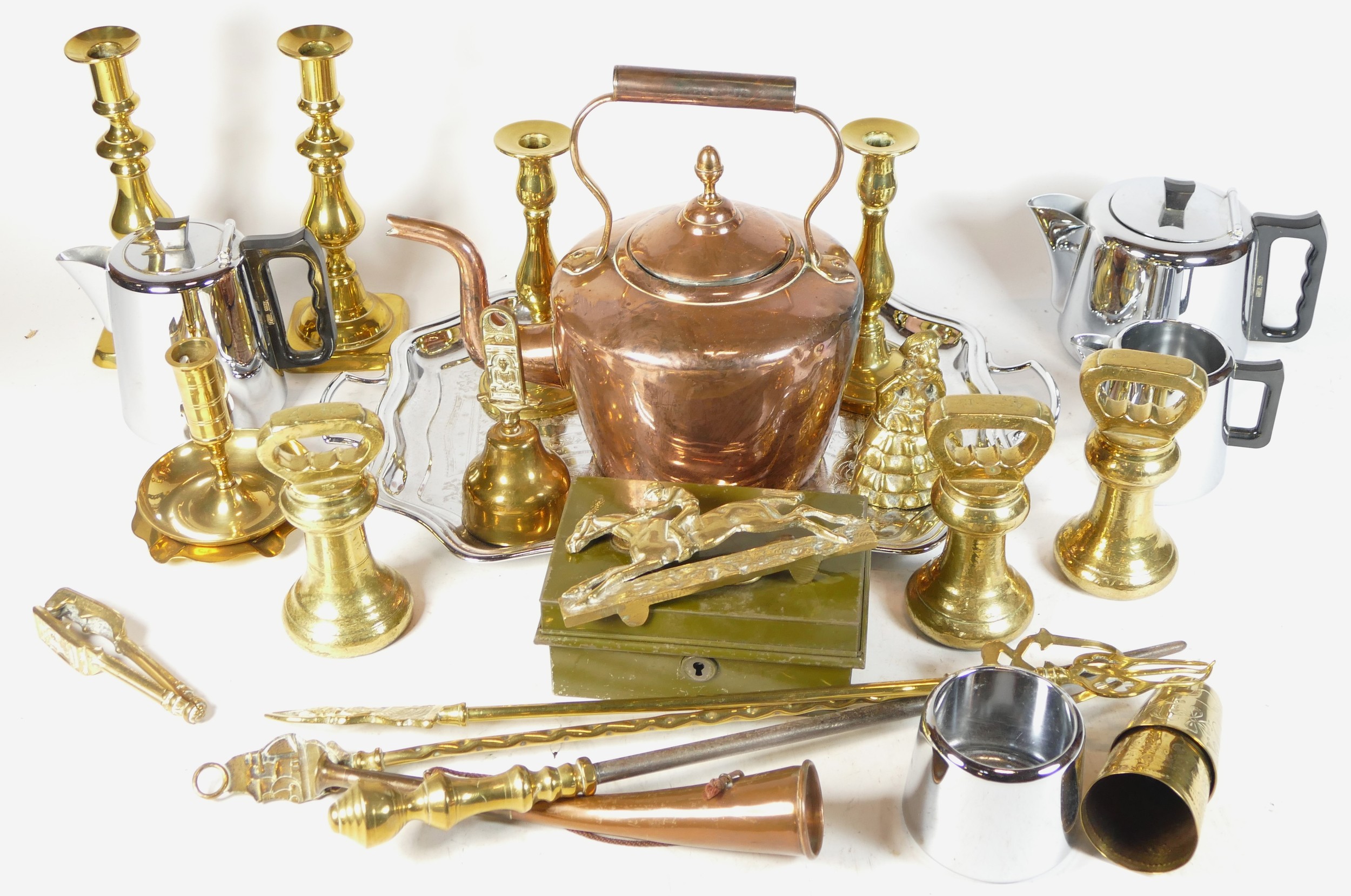 A collection of early 20th century and later brass and copper wares, to include bell weights, copper