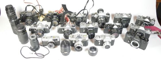 Fifteen SLR vintage film cameras to include a Cosina CS-1, a Pentax ME, a Petri TLR and a Zenit 122.
