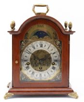 A modern Dutch mahogany case bracket clock, the arched brass dial with silvered chapter ring