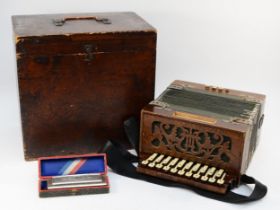 An early 20th century French piano accordion squeeze box, made by S.Vallier of Rouen France, with