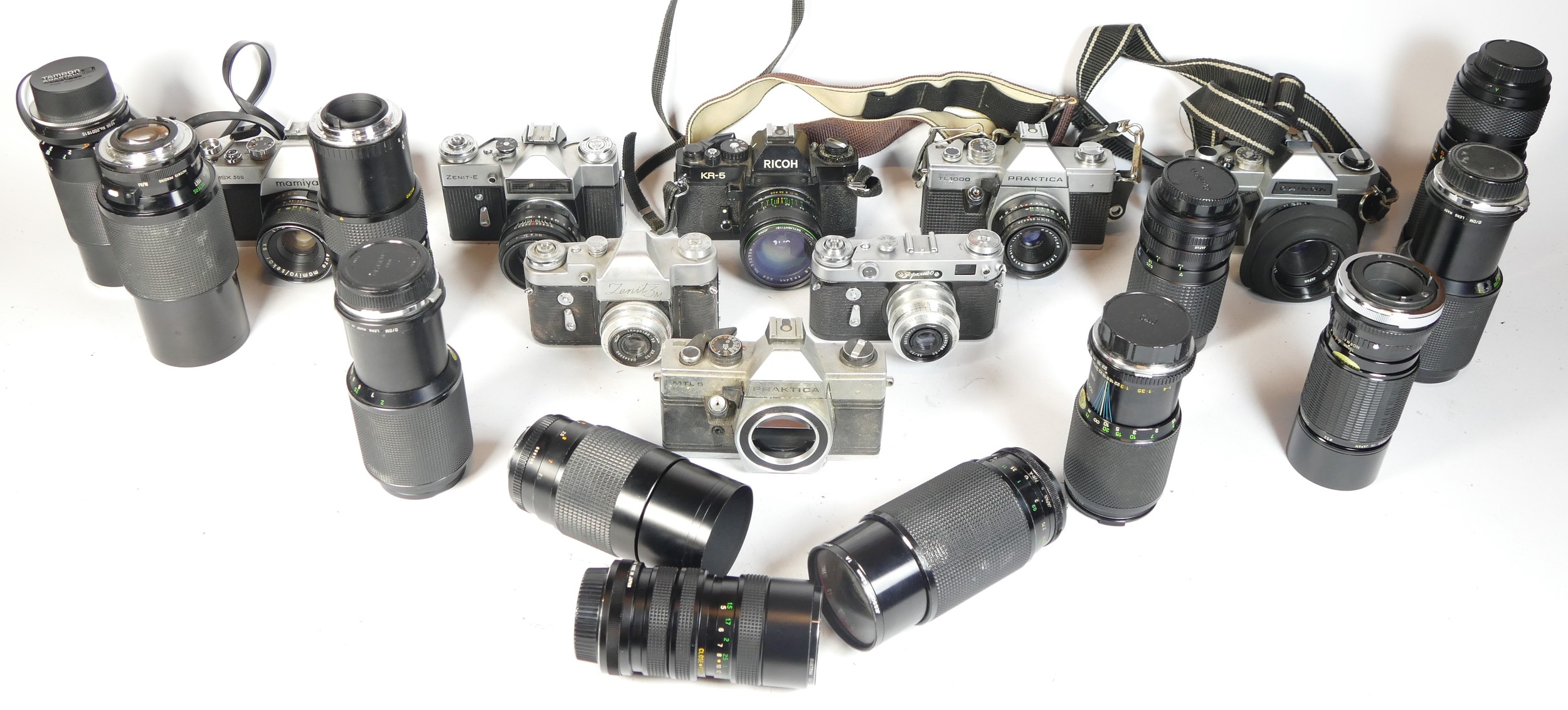 Eight SLR vintage film cameras to include a Mamiya MSX500, a Zenit 3m, a Praktica MTLS and a