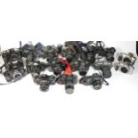 Seventeen SLR vintage film cameras to include a Praktica B200, a Canon EOS 1000, a Pentax P30 and