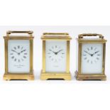 Three English brass carriage clocks, having 8 day jewelled movements, circa 1980s. (3)