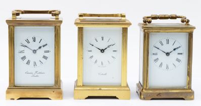 Three English brass carriage clocks, having 8 day jewelled movements, circa 1980s. (3)
