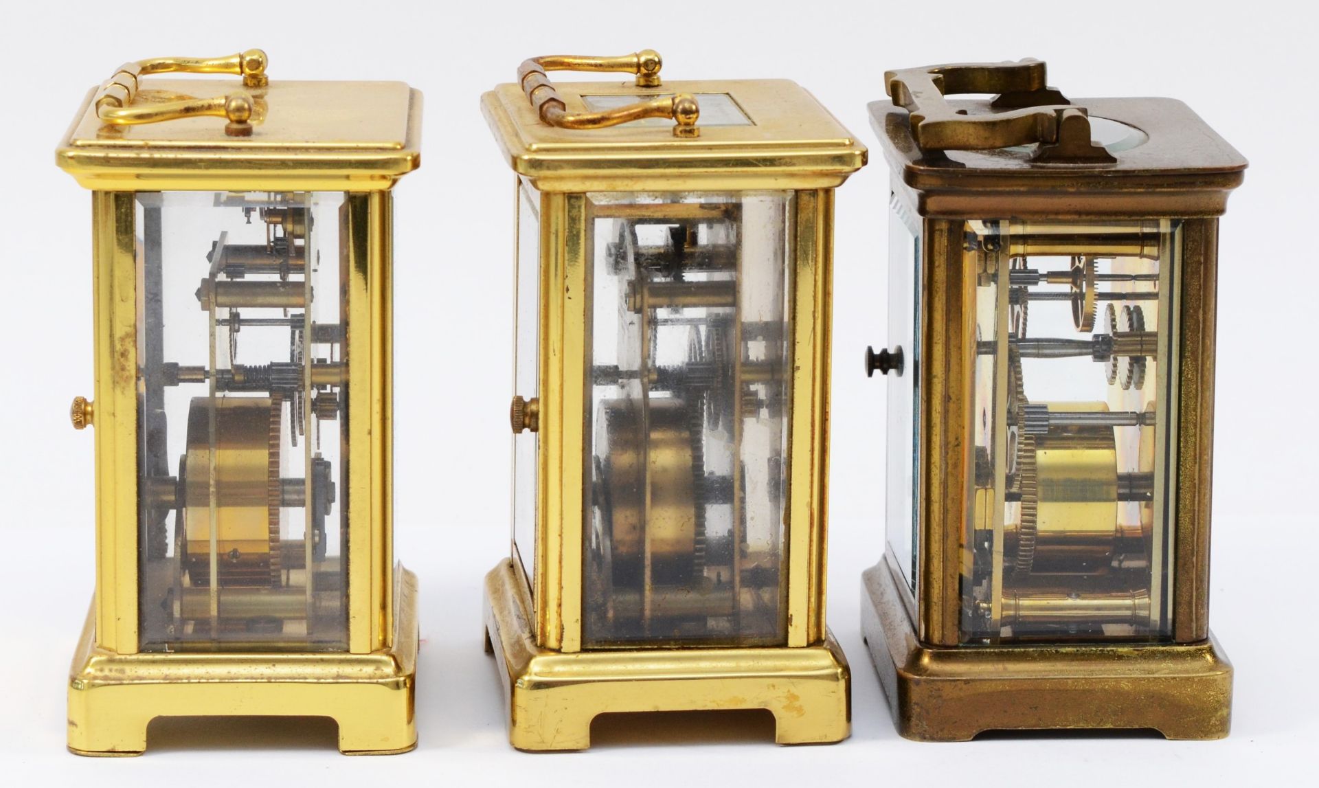 Three French 8 day carriage clocks, brass cased with enamelled dials and Roman numerals. (3) - Image 2 of 5