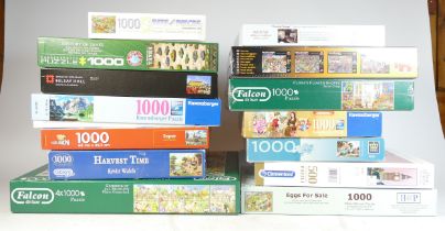 A collection of jigsaw puzzles (boxed) with a jigsaw fold board.