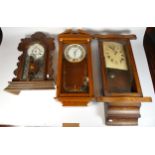 A collection of six Vienna style 8 day wall clocks, together with two Victorian slate mantel clocks,