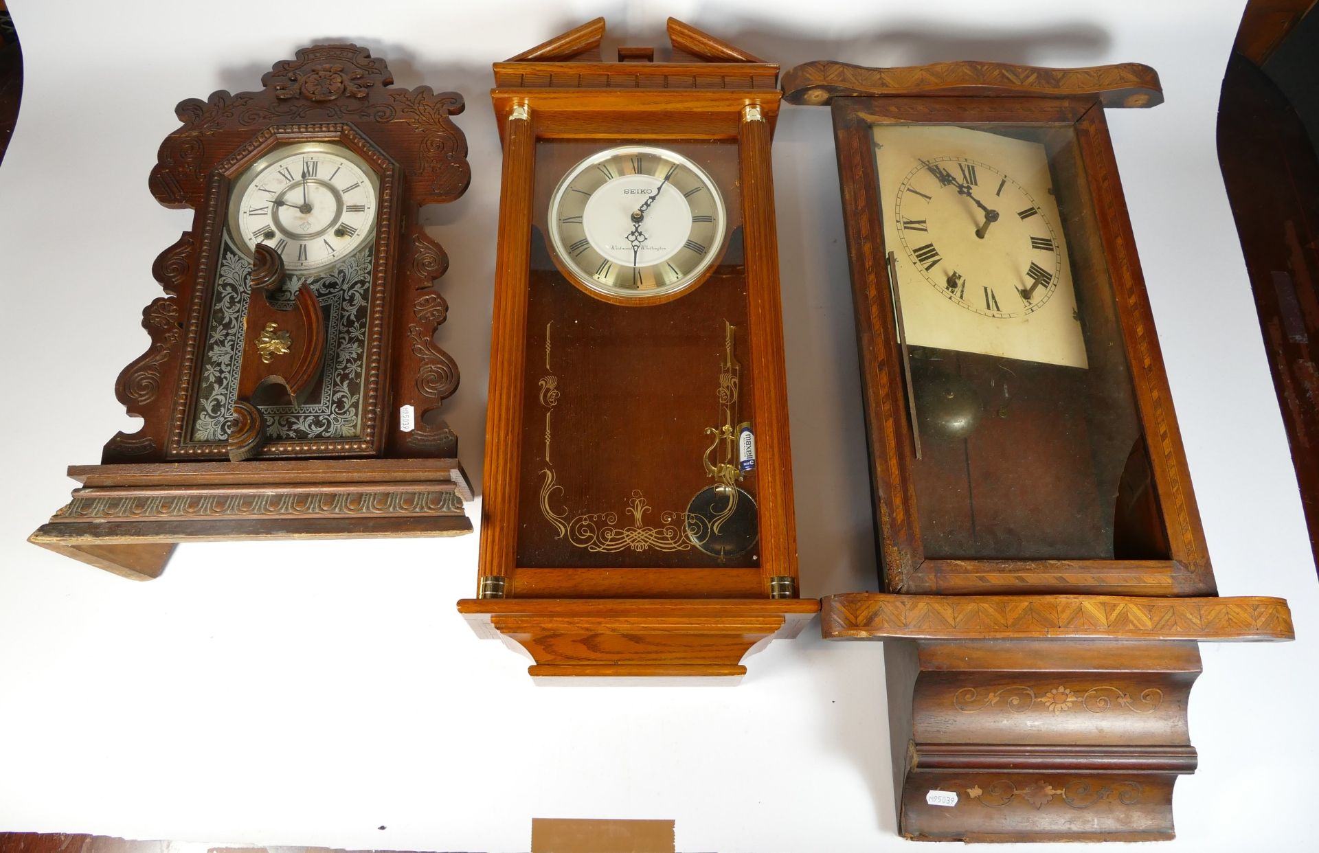 A collection of six Vienna style 8 day wall clocks, together with two Victorian slate mantel clocks,