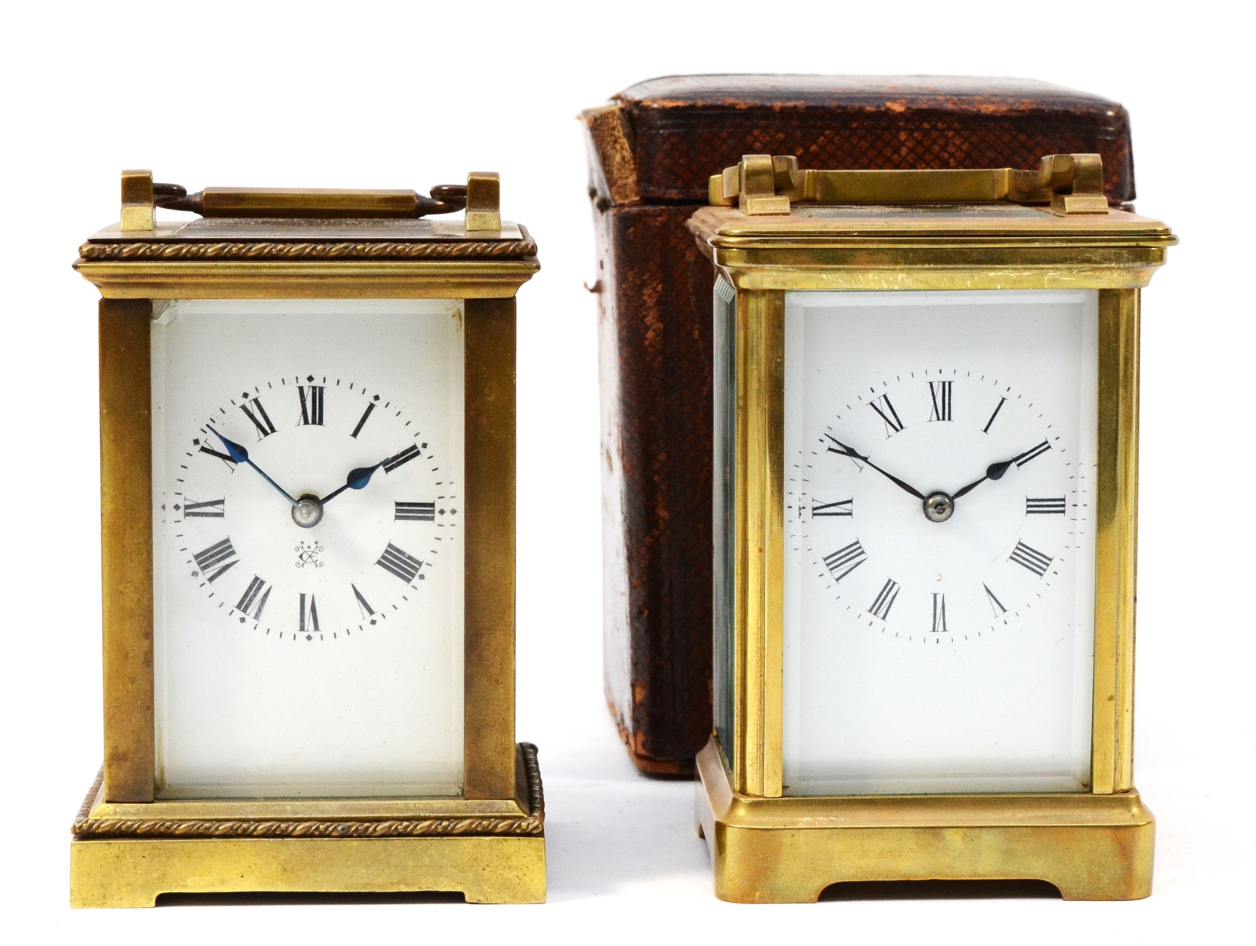 A 20th century brass case carriage clock, having 8 day movement striking on gong in traveling