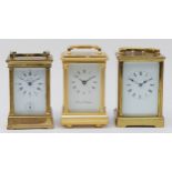 Three 20th century brass carriage clocks, having enamelled dials and 8 day movements. (3)
