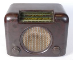 A mid 20th century Bush bakelite case valve radio, type DAC.90.