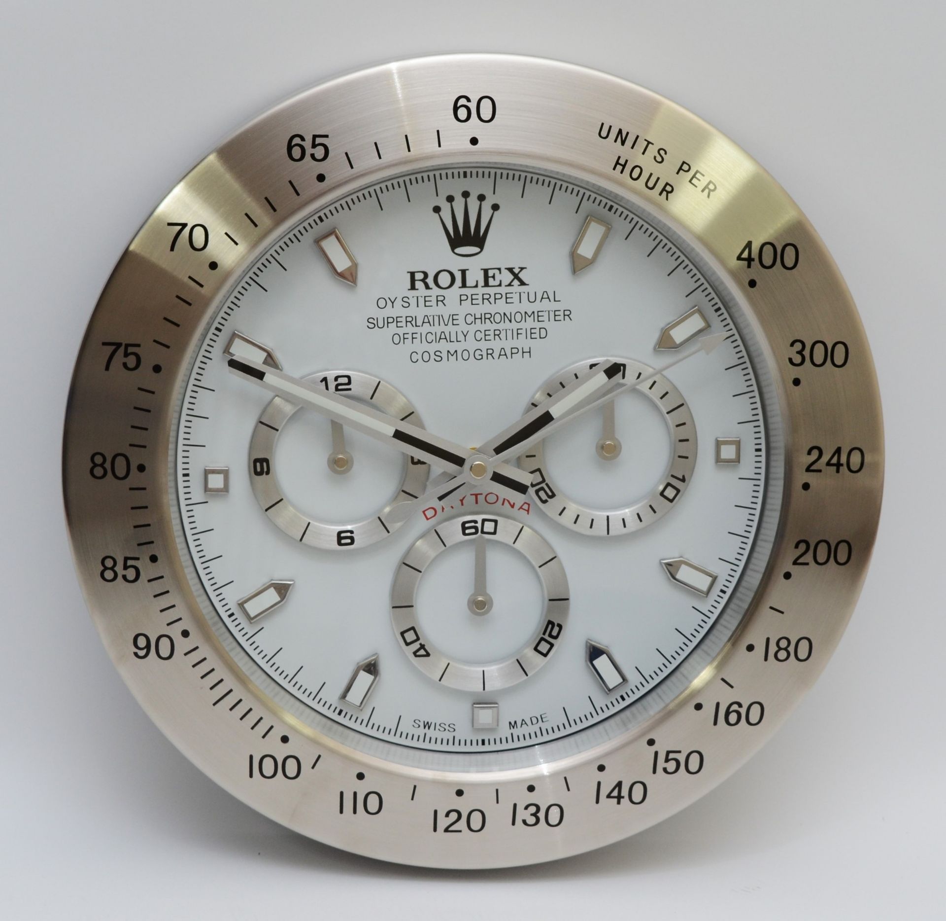 A 'Rolex' style advertising wall clock, white dial reads 'Rolex Oyster Perpetual Cosmograph