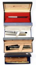 Sheaffer, a gold plated fountain pem with 14K gold nib, push button fill, named, case, another