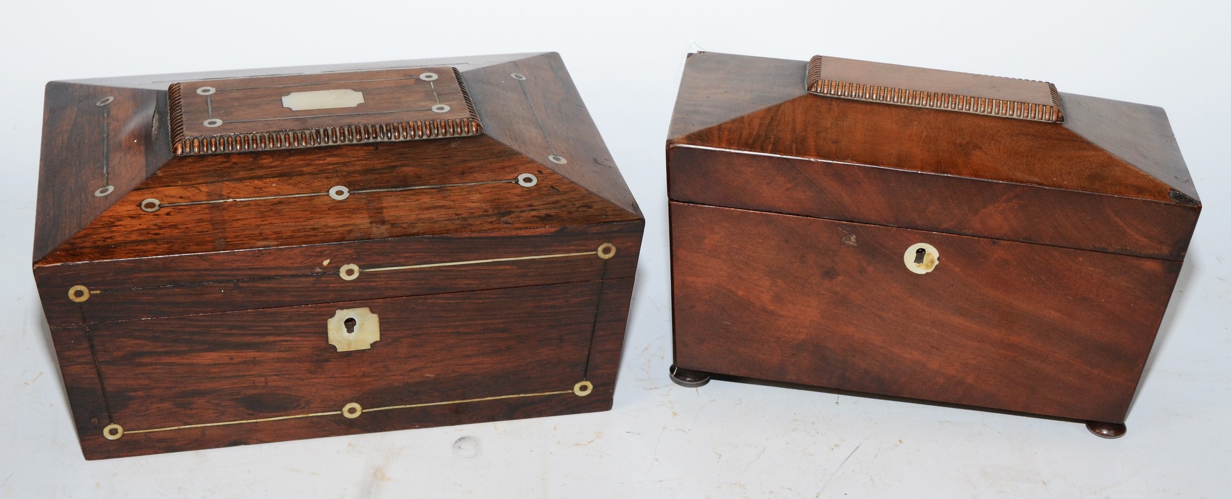 An Edwardian rosewood jewellery box, having inset mother of pearl decoration, 30x22cm, together with