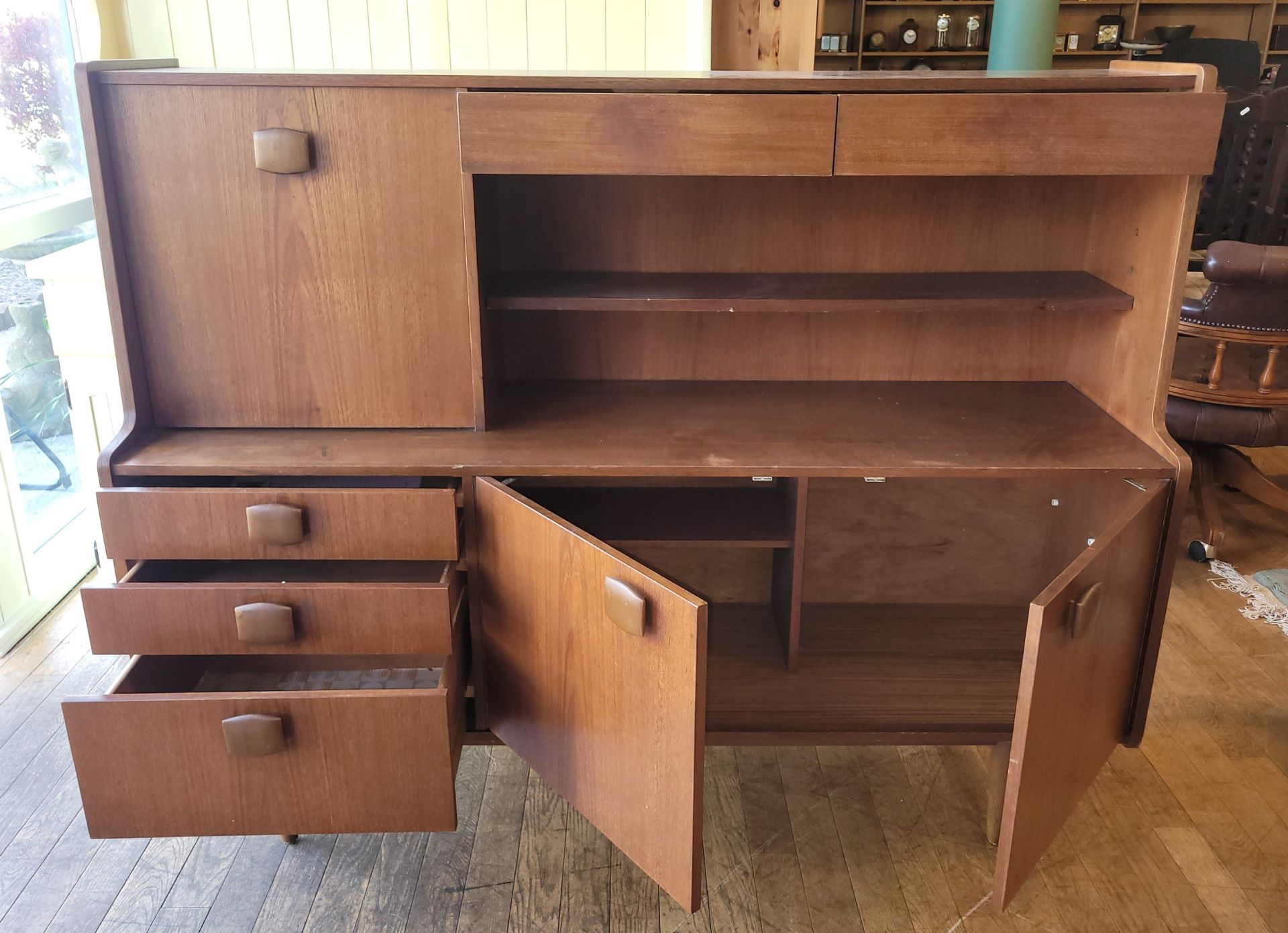 Stonehill Furniture: A mid 20th century teak sideboard/drinks cabinet. W152, H121, D45cm. - Image 2 of 4
