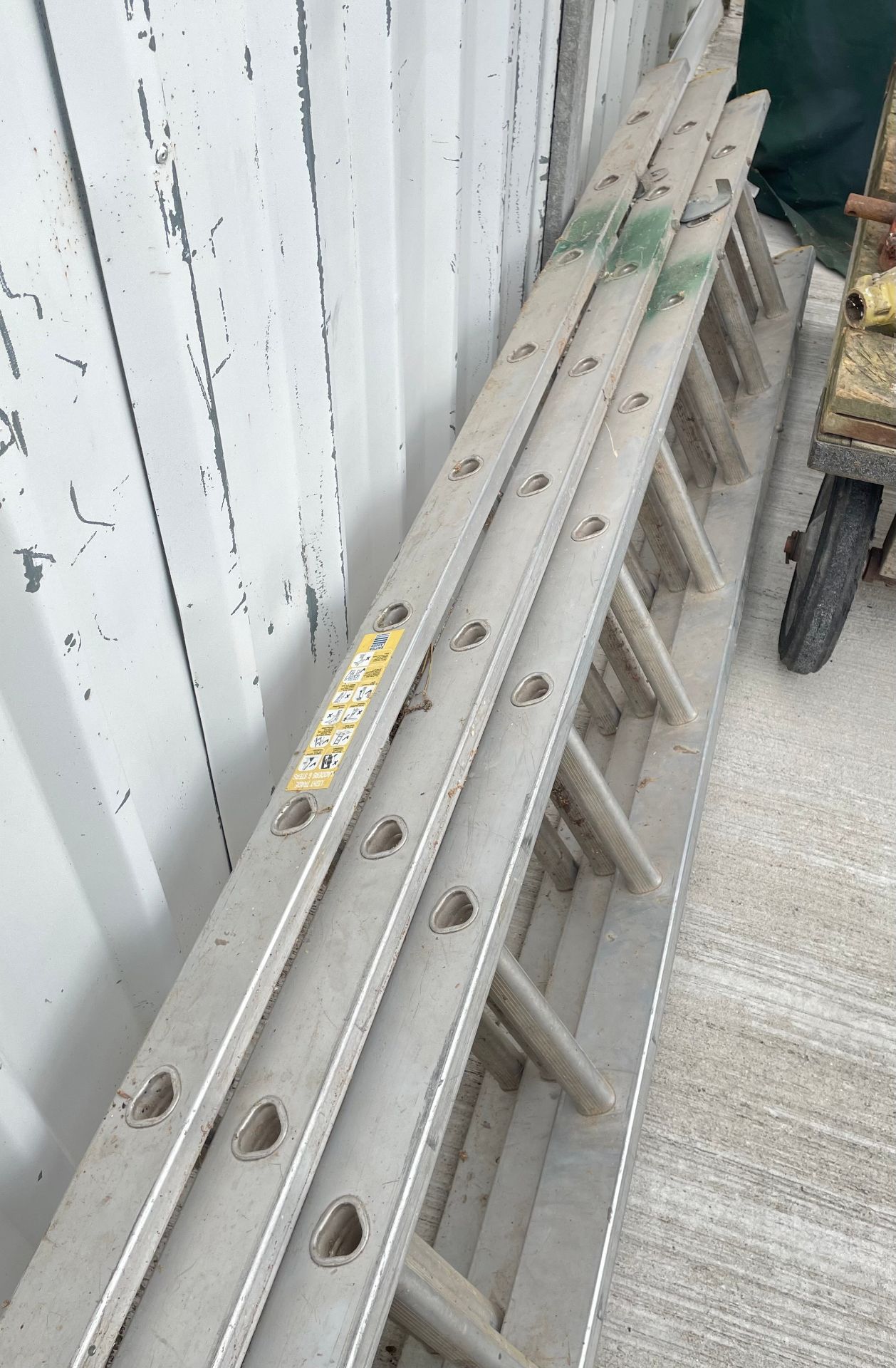 Light trade aluminium extending Ladders.