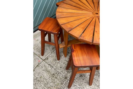 A child's pine garden table, 90cm diameter with six matching pine stools and a drum BBQ. - Image 2 of 4