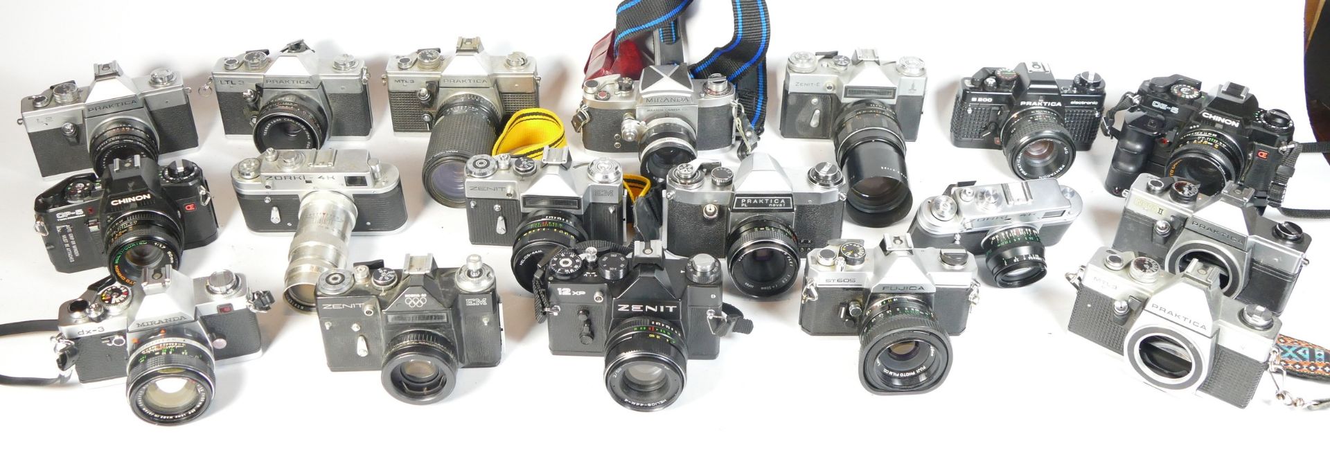Nineteen SLR vintage film cameras to include a Zenit 12xp, a Chinon CE-5, a Praktica Nova II and a