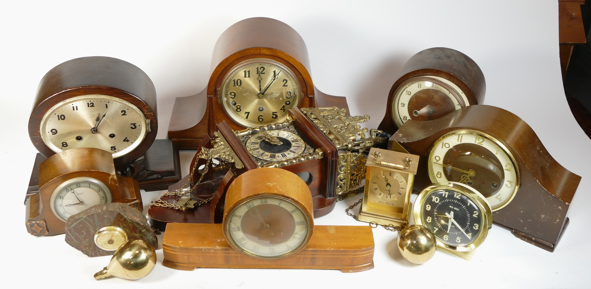 A collection of mid 20th century and later mantel clocks, alarm clocks and barometers in three - Image 2 of 3