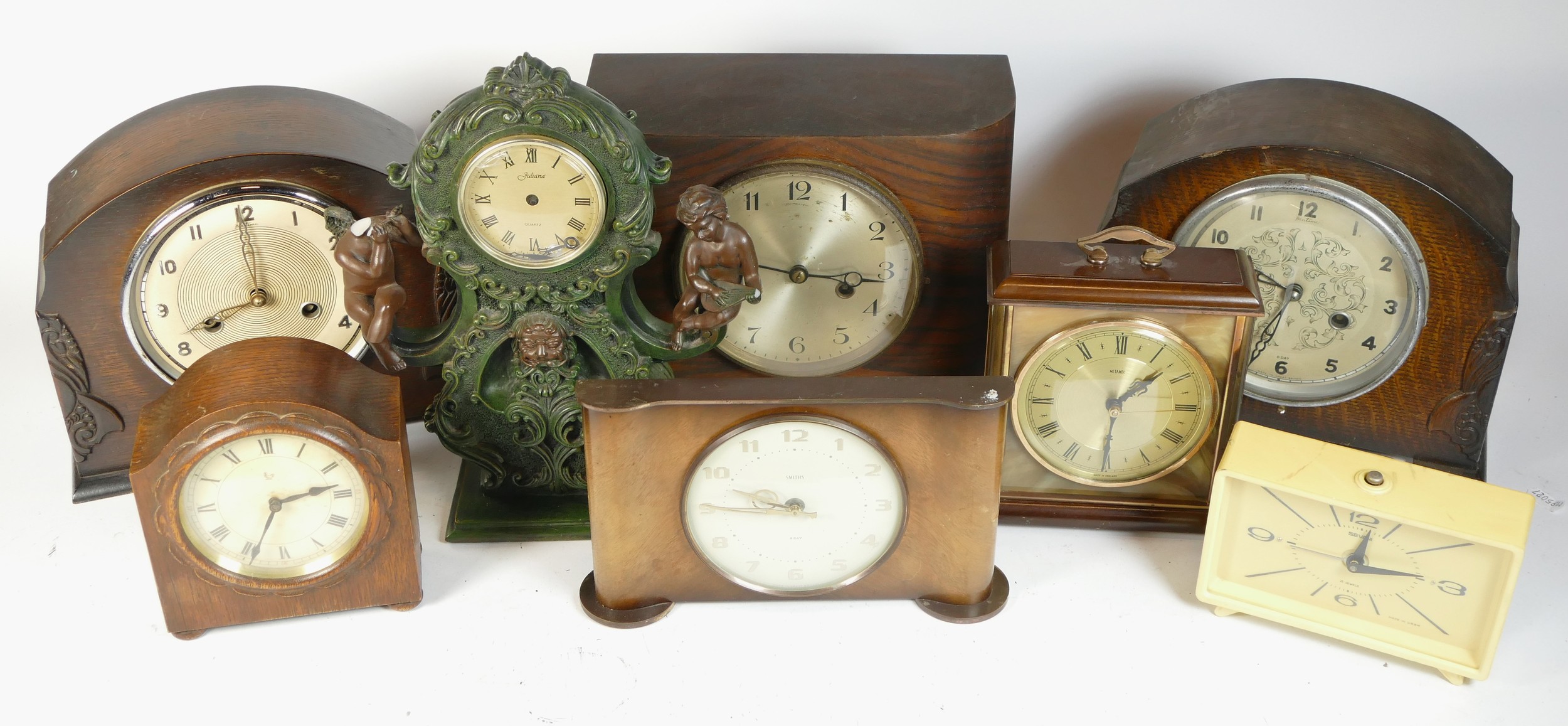 A collection of mid 20th century and later mantel clocks, alarm clocks and barometers in three - Image 2 of 3