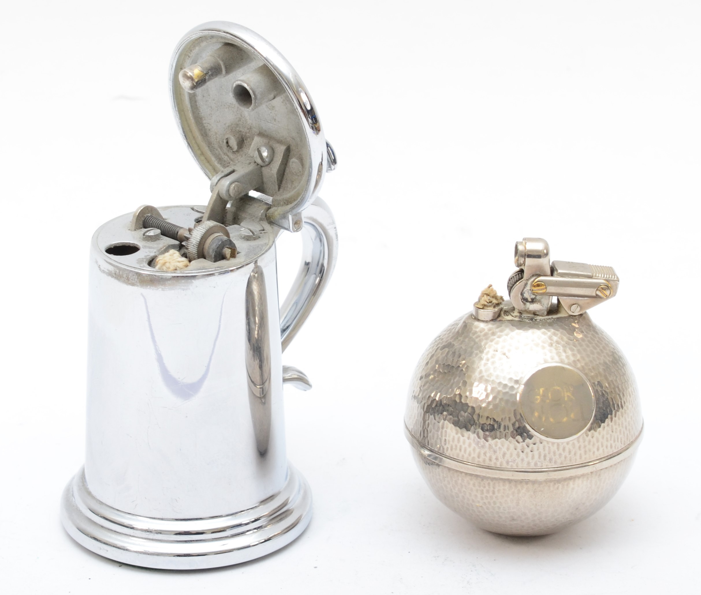 Dunhill, a chrome plated novelty petrol table lighter in the form of a lidded tankard, 9cm and