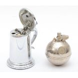 Dunhill, a chrome plated novelty petrol table lighter in the form of a lidded tankard, 9cm and