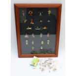 Collection of Robertsons enamelled Golly pin badges, loose and framed, circa mid 20th century and