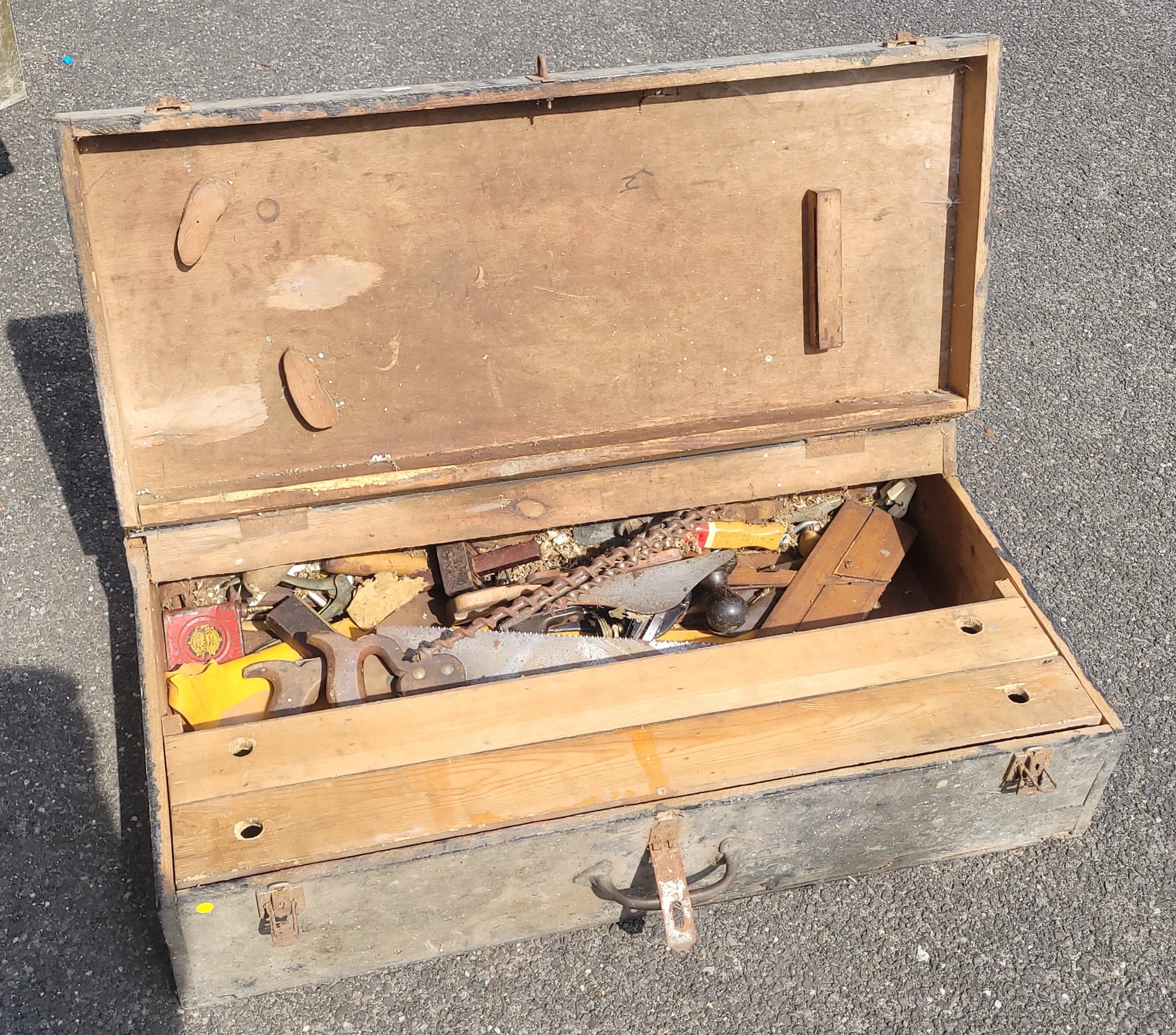 Two carpenters tool chests and contents, to include spanners, saws, planes, drill bits, socket