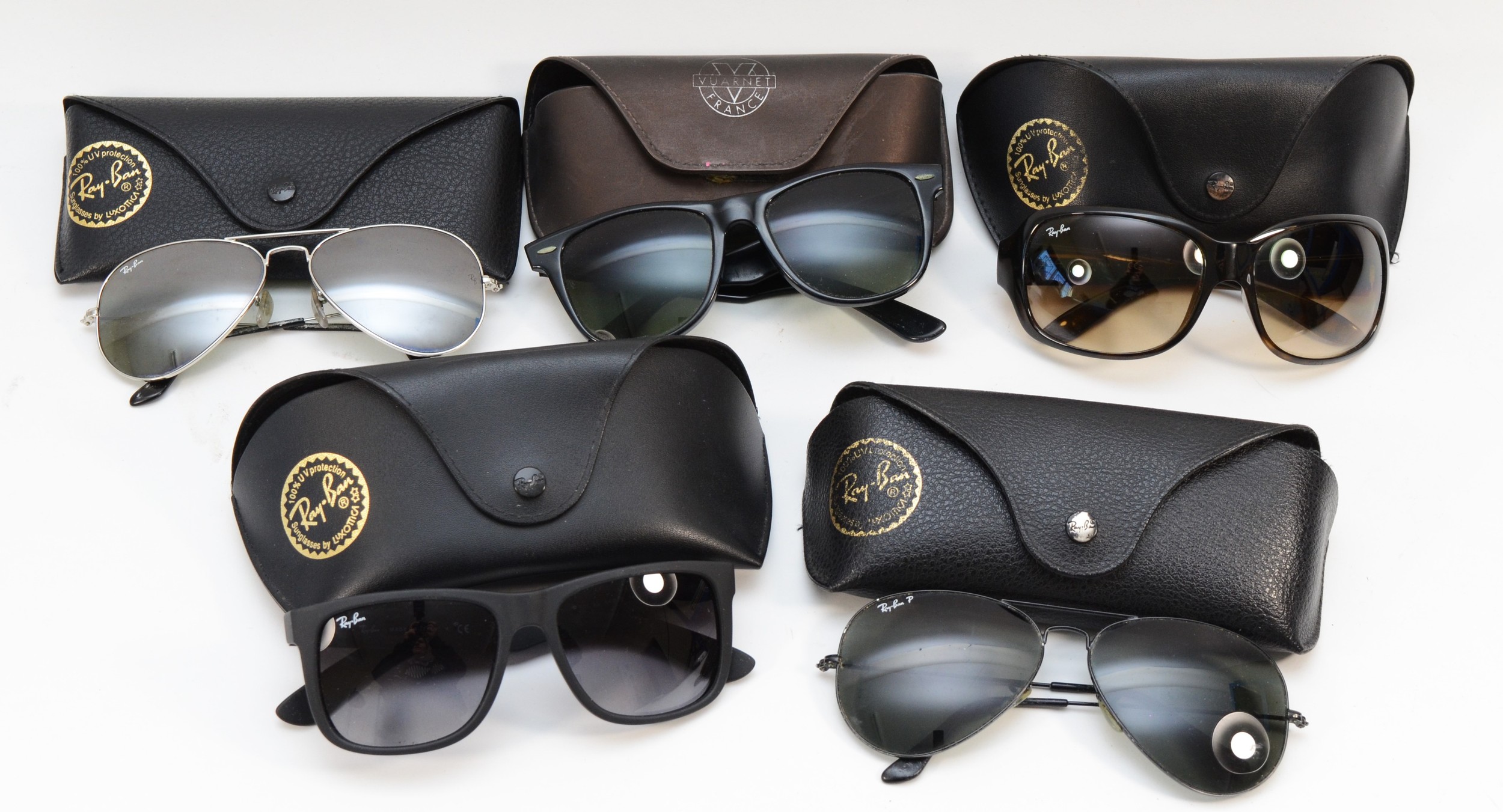 Five cased pairs of Ray-Ban sunglasses, two bearing model numbers - RB4118, RB4165, and one