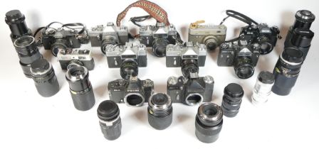 Eleven SLR vintage film cameras to include a Petri GX-1, a Ricoh KR-10, a Zenit EM and a Cosina CSR.