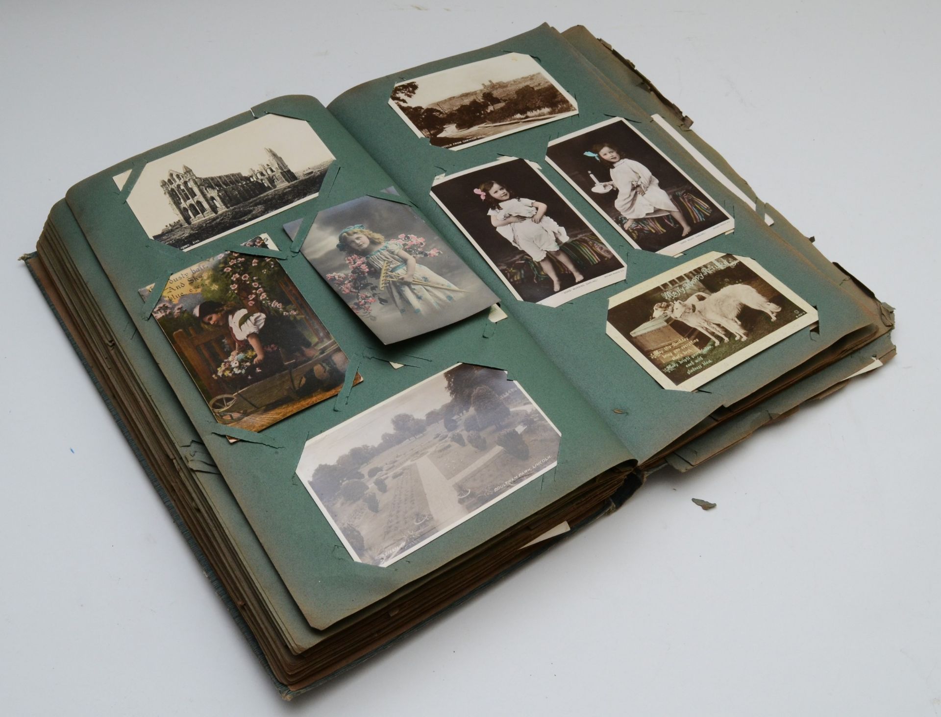 A postcard album and contents including over two hundred topical postcards, dating from early to mid - Image 2 of 3