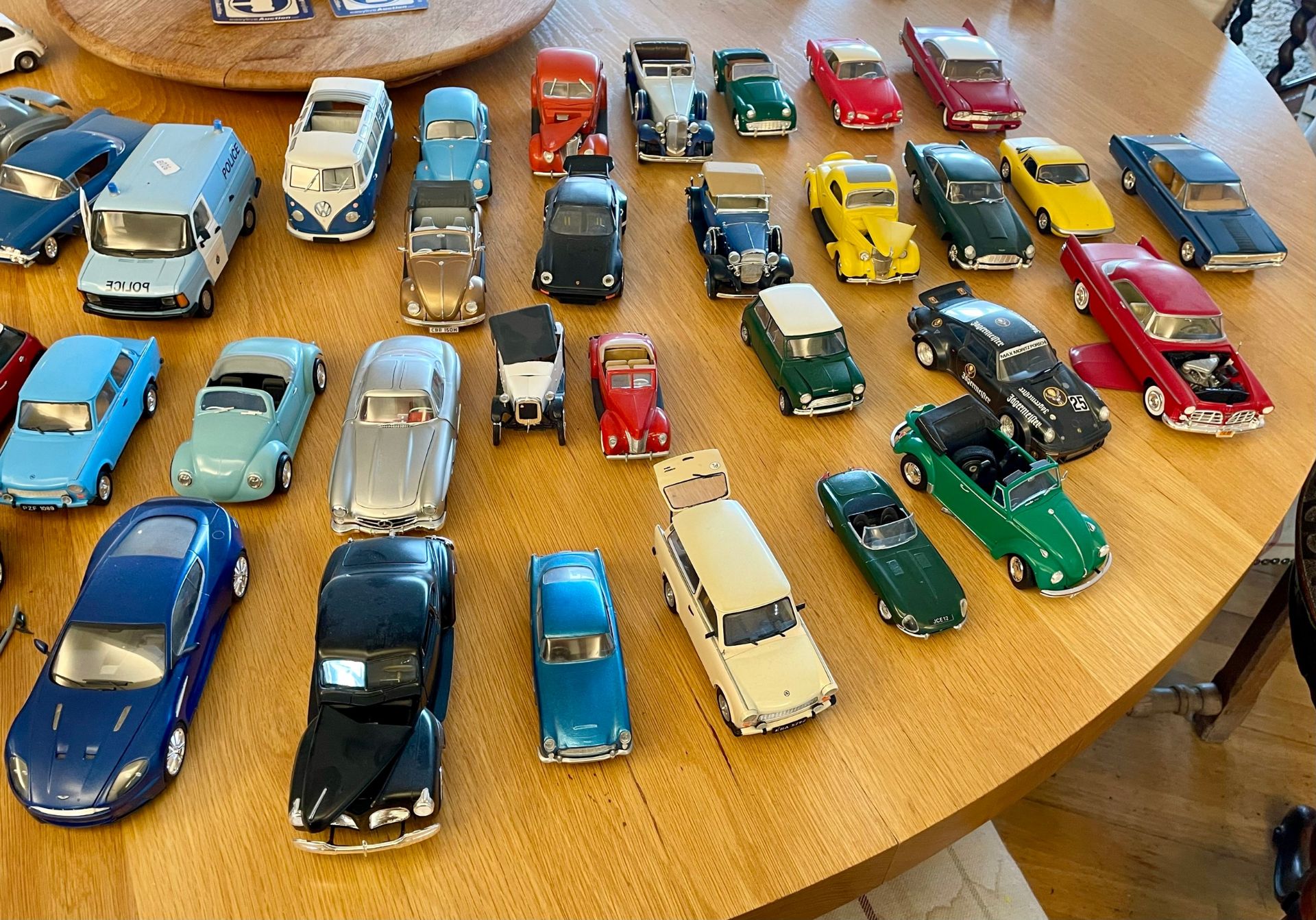 A large quantity of assembled plastic scale model cars to include several VW Beetles, a Mini and a - Image 3 of 3