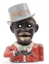 A painted cast metal 'Jolly Boy' mechanical money bank, depicted wearing a silvered top hat, 17cm