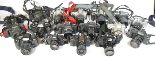 Twenty five SLR vintage film cameras to include a Miranda MS-2, a Canon T50, a Minolta 300si, a
