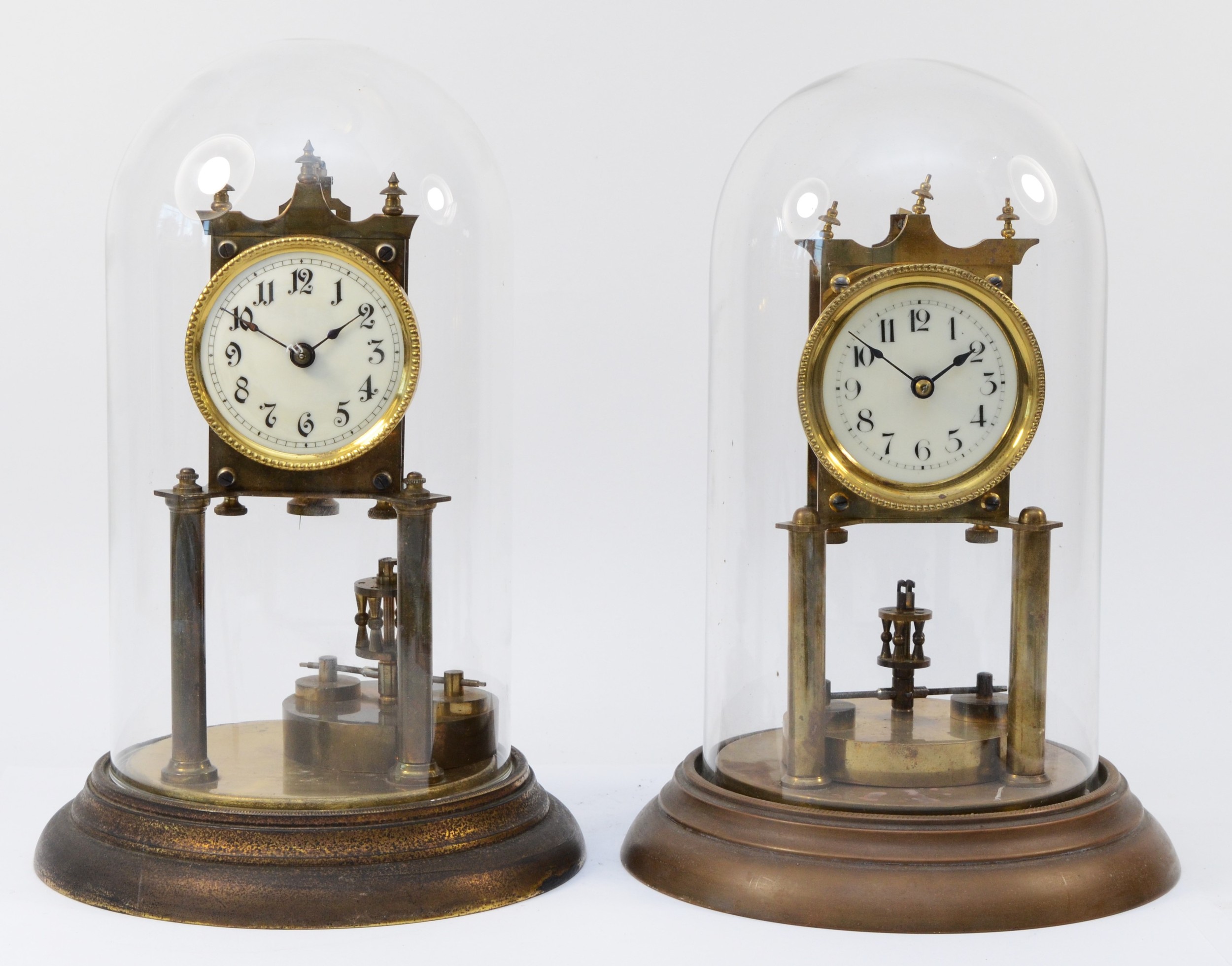 Two anniversary clocks, circa early 20th century, having single train movements fronted by porcelain