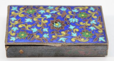 An unmarked white metal and enamel snuff box, possibly Indian, with floral decoration, 7.5 x 4.5 x