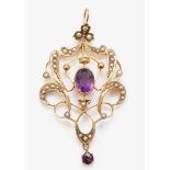 An Edwardian 9ct gold amethyst and half pearl open work scroll pendant, 47mm, 2.7gm