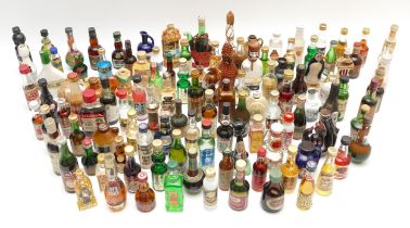 A large quantity of alcohol miniatures to include Gilbeys gin, Pickwick Scotch whisky, Leg Bender-