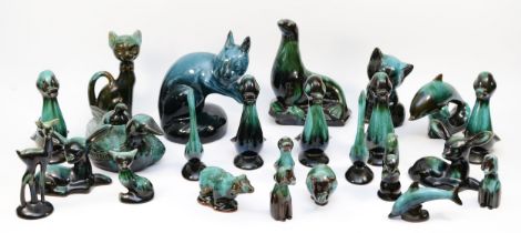 A collection of Canadian Blue Mountain pottery studies, black with green drip glaze colourway,