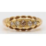 An antique 18ct gold and old cut diamond five stone ring, Birmingham 1913, K, 3gms, one stone a