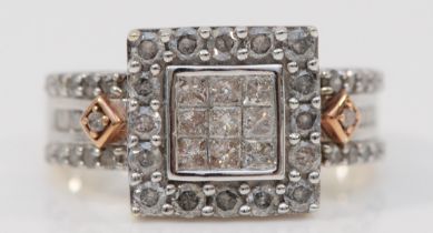 A 9ct white gold and diamond square cluster ring, set with Princess cut stones bordered by