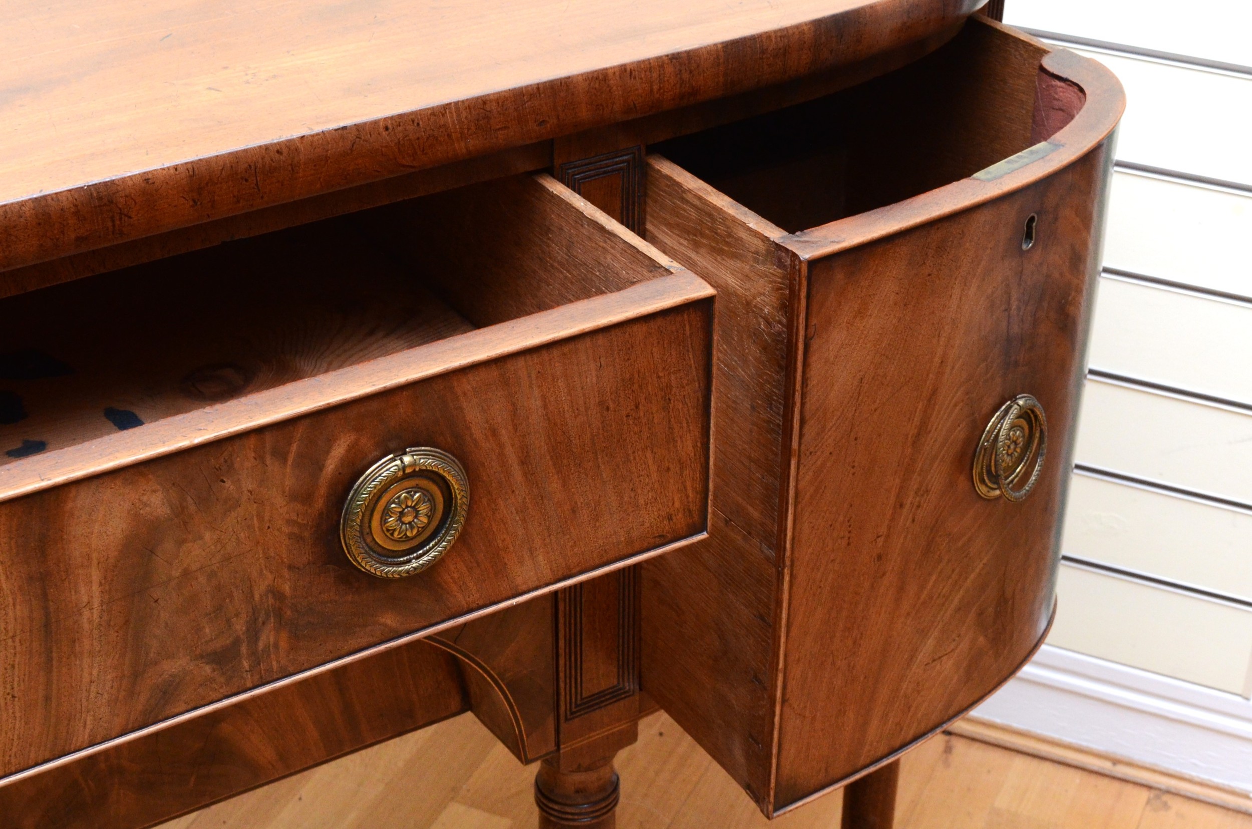 A late Victorian Hepplewhite style mahogany sideboard, the two bow fronted cupboards flanking two - Image 3 of 4