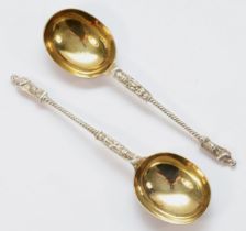 A Victorian silver pair of serving spoons, makers mark poorly struck, London 1881, the cast